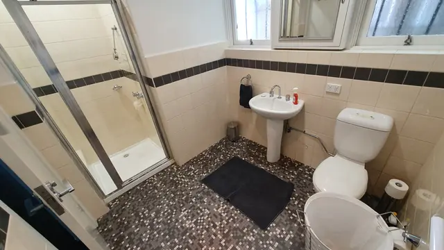 Middle Bathroom at Toorak Luxury Living